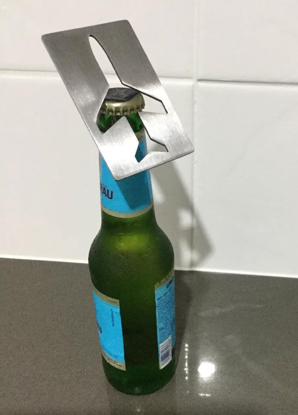 Aeroplane shaped bottle opener in solid metal, made in Australia
